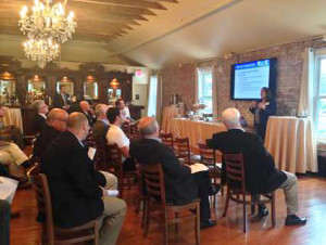 Margo McDonnell, of 1031 Corp., speaks about 1031 exchanges at the event held May 11, in Conshohocken.